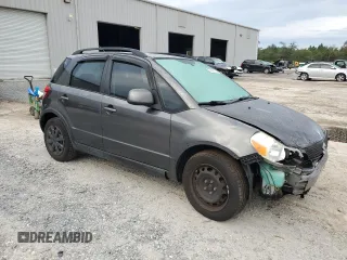 2010 Suzuki SX4 with VIN JS2YA5A38A6301304, listed as a Copart auction lot 73658134 with 119,177 mi miles and Salvage Title. Bid and sale history available at carsss.com. Image 4.