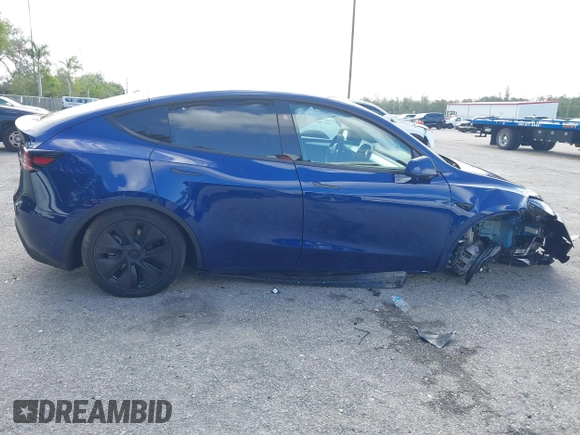 2025 Tesla Model Y Long Range z VIN 7SAYGDED0SF256650, wystawiony jako IAAI lot #41993206 z przebiegiem Nie podano mil oraz . Historia ofert i sprzedaży dostępna na DreamBid. Obrazek 13.