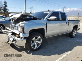 2014 Chevrolet Silverado 1500 LT with VIN 1GCRCREC0EZ354240, listed as a Copart auction lot 43994975 with 126,185 mi miles and Salvage Title. Bid and sale history available at DreamBid. Image 1.