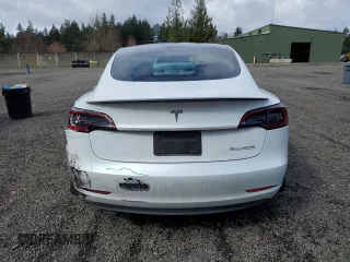 2023 Tesla Model 3 Performance with VIN 5YJ3E1EC0PF498509, listed as a Copart auction lot 50579835 with 32,327 mi miles and Salvage Title. Bid and sale history available at carsss.com. Image 6.