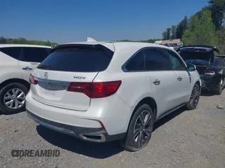 2020 Acura MDX w/Technology Pkg with VIN 5J8YD3H56LL013803, listed as a IAAI auction lot 41983696 with 58,346 mi miles. Bid and sale history available at carsss.com. Image 4.