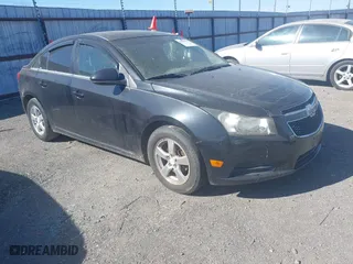 2011 Chevrolet Cruze LT w/2LT with VIN 1G1PG5S90B7128292, listed as a IAAI auction lot 41848633 with 182,963 mi miles. Bid and sale history available at carsss.com. Image 1.