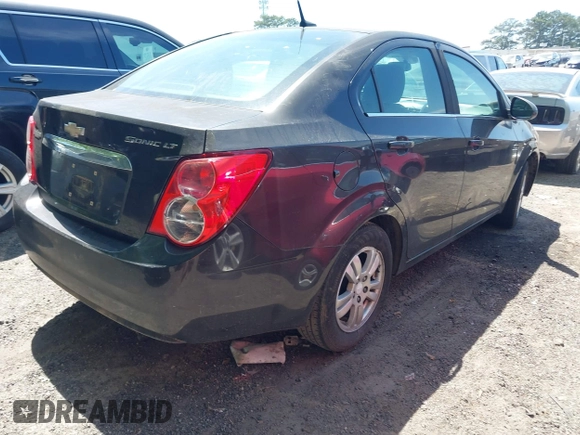 2013 Chevrolet Sonic LT with VIN 1G1JC5SH6D4201811, listed as a IAAI auction lot 42082122 with 212,944 mi miles and . Bid and sale history available at DreamBid. Image 4.