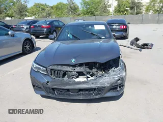 2021 BMW 3 Series 330i с VIN 3MW5R1J03M8B96458, выставлен на аукционе IAAI как лот 42355921 с пробегом Не указан миль и . История ставок и продаж доступна на DreamBid. Изображение 13.