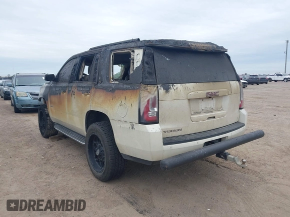 2015 GMC Yukon SLT with VIN 1GKS1BKC0FR114047, listed as a IAAI auction lot 41272792 with 1 mi miles. Bid and sale history available at carsss.com. Image 3.