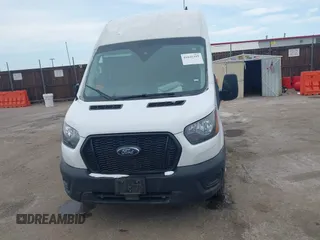 2023 Ford Transit Cargo with VIN 1FTBR2X87PKA51211, listed as a IAAI auction lot 41631315 with 42,688 mi miles and . Bid and sale history available at DreamBid. Image 12.