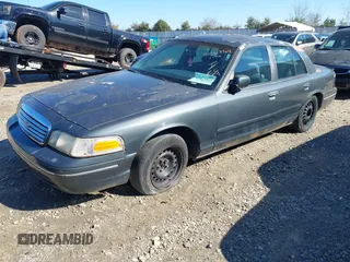 1998 Ford Crown Victoria Police with VIN 2FAFP71WXWX184526, listed as a IAAI auction lot 41563307 with 309,303 mi miles. Bid and sale history available at carsss.com. Image 2.