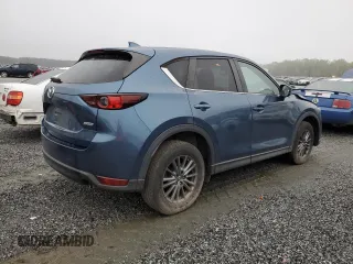 2017 Mazda CX-5 Touring with VIN JM3KFBCLXH0124451, listed as a Copart auction lot 51060275 with 126,807 mi miles and Salvage Title. Bid and sale history available at carsss.com. Image 3.