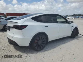 2022 Tesla Model Y Performance with VIN 7SAYGDEFXNF410531, listed as a Copart auction lot 54449715 with Not Provided miles and Non Repairable. Bid and sale history available at DreamBid. Image 3.