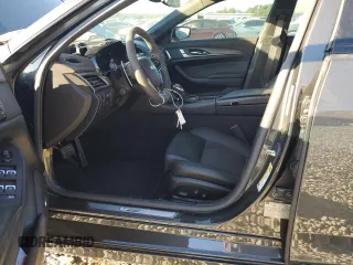 2016 Cadillac CTS-V z VIN 1G6A15S62G0131430, wystawiony jako Copart lot #74071784 z przebiegiem 93 918 mil mil oraz Szkody całkowita. Historia ofert i sprzedaży dostępna na DreamBid. Obrazek 7.