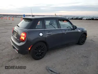 2019 MINI Hardtop 4 Door Cooper S z VIN WMWXU3C56K2H86633, wystawiony jako Copart lot #84340094 z przebiegiem 67 712 mil mil oraz Szkoda całkowita • Salvage title. Historia ofert i sprzedaży dostępna na DreamBid. Obrazek 3.