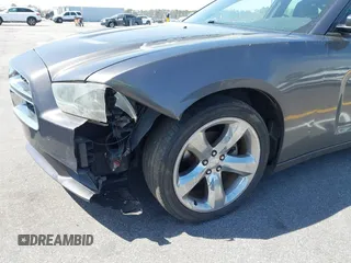 2014 Dodge Charger SE with VIN 2C3CDXBG0EH216023, listed as a IAAI auction lot 41827307 with 243,107 mi miles. Bid and sale history available at carsss.com. Image 6.