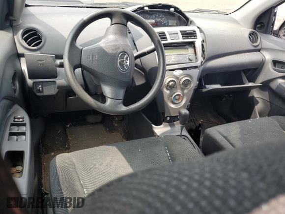 2012 Toyota Yaris z VIN JTDBT4K38C1414236, wystawiony jako Copart lot #58471515 z przebiegiem Nie podano mil oraz Szkoda całkowita • Salvage title. Historia ofert i sprzedaży dostępna na DreamBid. Obrazek 8.