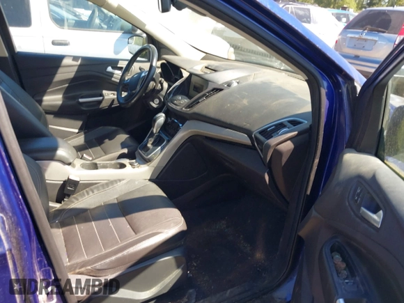 2013 Ford Escape SEL with VIN 1FMCU9HX3DUB97778, listed as a IAAI auction lot 42195445 with 147,154 mi miles. Bid and sale history available at carsss.com. Image 5.