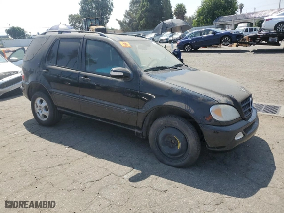 2002 Mercedes-Benz M-Class with VIN 4JGAB54E32A338132, listed as a Copart auction lot 67854164 with 0 mi miles and Salvage Title. Bid and sale history available at carsss.com. Image 4.