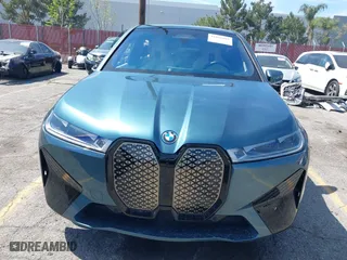 2022 BMW iX xDrive50 with VIN WB523CF09NCK59676, listed as a IAAI auction lot 41866019 with 1 mi miles. Bid and sale history available at carsss.com. Image 12.