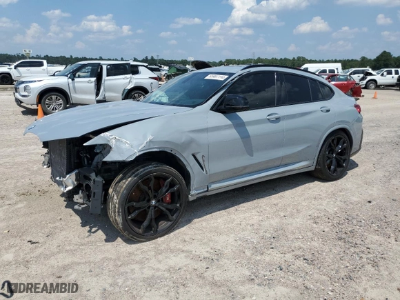 2022 BMW X4 M with VIN 5YM23EC02N9K87490, listed as a Copart auction lot 65907114 with 55555 miles and Salvage Title. Bid and sale history available at carsss.com. Image 1.