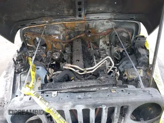2000 Jeep Wrangler Sport with VIN 1J4FA49S5YP797345, listed as a IAAI auction lot 40322775 with Not Provided miles and . Bid and sale history available at DreamBid. Image 6.