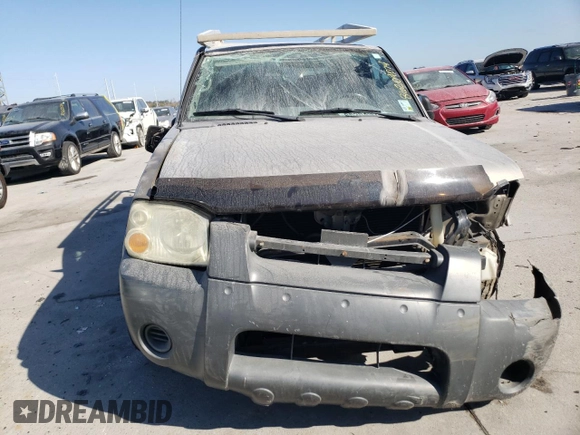 2002 Nissan Frontier SE with VIN 1N6ED27T52C383700, listed as a Copart auction lot 86204074 with 216,908 mi miles and Salvage title. Bid and sale history available at DreamBid. Image 5.