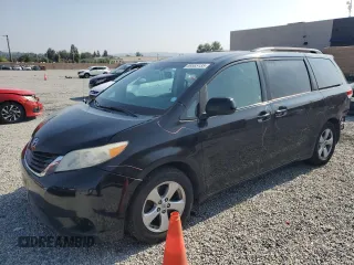 2012 Toyota Sienna LE AAS with VIN 5TDKK3DC0CS182986, listed as a Copart auction lot 59565135 with 180,765 mi miles and Salvage title. Bid and sale history available at DreamBid. Image 1.