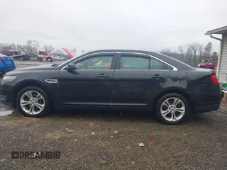 2013 Ford Taurus SEL with VIN 1FAHP2E83DG107913, listed as a IAAI auction lot 42007575 with 147,240 mi miles. Bid and sale history available at carsss.com. Image 15.
