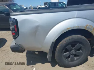 2011 Nissan Frontier Pro-4X with VIN 1N6AD0EVXBC407089, listed as a IAAI auction lot 42113537 with 124,853 mi miles and . Bid and sale history available at DreamBid. Image 6.