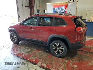 2016 Jeep Cherokee Trailhawk with VIN 1C4PJMBS2GW298186, listed as a Copart auction lot 62999945 with 153,064 mi miles and Salvage title. Bid and sale history available at DreamBid. Image 2.