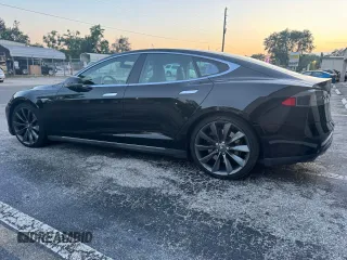 2014 Tesla Model S 60 with VIN 5YJSA1H10EFP49351, listed as a Copart auction lot 54173275 with 96,300 mi miles and Clean Title. Bid and sale history available at DreamBid. Image 3.