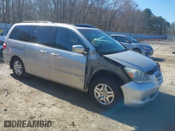 2005 Honda Odyssey EX-L with VIN 5FNRL38725B098992, listed as a IAAI auction lot 41639045 with 230,257 mi miles. Bid and sale history available at carsss.com. Image 1.