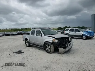 2005 Nissan Frontier LE with VIN 1N6AD07U75C452872, listed as a Copart auction lot 54954555 with 230,702 mi miles and Salvage title. Bid and sale history available at DreamBid. Image 13.