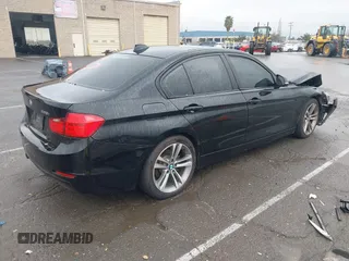 2015 BMW 3 Series 328i with VIN WBA3A5G51FNS83378, listed as a IAAI auction lot 41719392 with 114,146 mi miles. Bid and sale history available at carsss.com. Image 4.