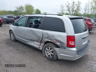 2010 Chrysler Town & Country Touring with VIN 2A4RR5D14AR271397, listed as a IAAI auction lot 42181231 with 200,547 mi miles and . Bid and sale history available at DreamBid. Image 3.