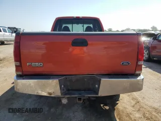 1999 Ford F-250 XL with VIN 1FTNX21SXXEE40026, listed as a Copart auction lot 69888634 with 215,535 mi miles and Salvage title. Bid and sale history available at DreamBid. Image 6.