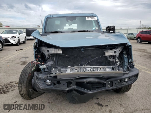 2021 Ford Bronco z VIN 1FMEE5BP8MLA68271, wystawiony jako Copart lot #72126884 z przebiegiem 36 942 mil mil oraz Szkoda całkowita • Salvage title. Historia ofert i sprzedaży dostępna na DreamBid. Obrazek 5.