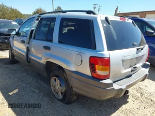 2004 Jeep Grand Cherokee Laredo with VIN 1J4GW48S94C395238, listed as a IAAI auction lot 41860025 with 1 mi miles. Bid and sale history available at carsss.com. Image 3.