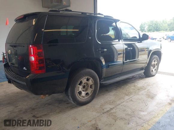 2007 Chevrolet Tahoe LT with VIN 1GNFC13037J129669, listed as a IAAI auction lot 42421808 with 268,523 mi miles and . Bid and sale history available at DreamBid. Image 4.