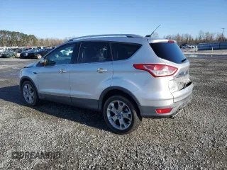 2015 Ford Escape Titanium with VIN 1FMCU0J91FUA94899, listed as a Copart auction lot 47746295 with 138,532 mi miles and Salvage Title. Bid and sale history available at DreamBid. Image 2.