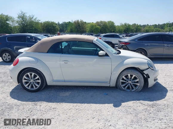 2013 Volkswagen Beetle 2.5L with VIN 3VW5P7AT3DM811617, listed as a IAAI auction lot 42055769 with 93,810 mi miles and . Bid and sale history available at DreamBid. Image 13.