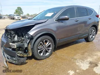 2021 Honda CR-V EX with VIN 2HKRW1H59MH404256, listed as a IAAI auction lot 41711235 with 100,389 mi miles. Bid and sale history available at carsss.com. Image 2.