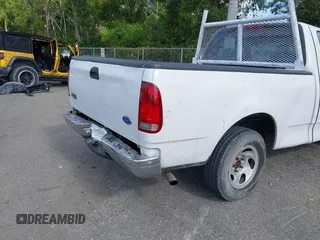 1999 Ford F-150 z VIN 1FTZF1729XKB56992, wystawiony jako IAAI lot #42112335 z przebiegiem 230 061 mil mil oraz . Historia ofert i sprzedaży dostępna na DreamBid. Obrazek 6.