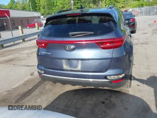 2021 Kia Sportage EX z VIN KNDPNCAC4M7897590, wystawiony jako IAAI lot #42183678 z przebiegiem 110 657 mil mil oraz . Historia ofert i sprzedaży dostępna na DreamBid. Obrazek 16.