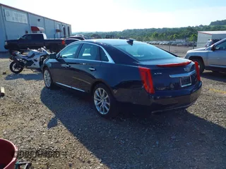 2016 Cadillac XTS Luxury Collection with VIN 2G61M5S37G9123956, listed as a IAAI auction lot 42421872 with 107,586 mi miles and . Bid and sale history available at DreamBid. Image 3.