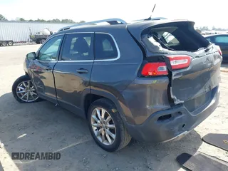 2014 Jeep Cherokee Limited with VIN 1C4PJLDS4EW283855, listed as a IAAI auction lot 41840848 with 143,686 mi miles. Bid and sale history available at carsss.com. Image 3.