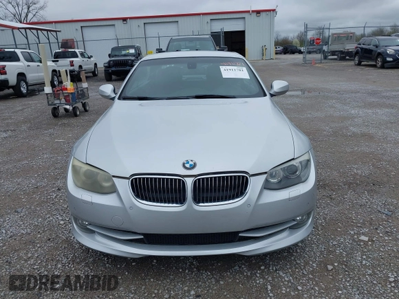 2011 BMW 3 Series 335i with VIN WBADX7C52BE581856, listed as a IAAI auction lot 41911781 with 130,606 mi miles and . Bid and sale history available at DreamBid. Image 12.