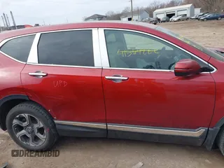 2018 Honda CR-V EX with VIN 2HKRW1H52JH523178, listed as a IAAI auction lot 41699500 with 81,377 mi miles and . Bid and sale history available at carsss.com. Image 13.