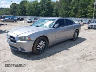 2013 Dodge Charger SE z VIN 2C3CDXBG0DH639988, wystawiony jako IAAI lot #40032112 z przebiegiem 197 941 mil mil oraz . Historia ofert i sprzedaży dostępna na DreamBid. Obrazek 2.