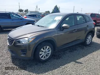 2016 Mazda CX-5 Sport with VIN JM3KE4BY8G0785812, listed as a IAAI auction lot 42324083 with 57,405 mi miles and . Bid and sale history available at DreamBid. Image 17.