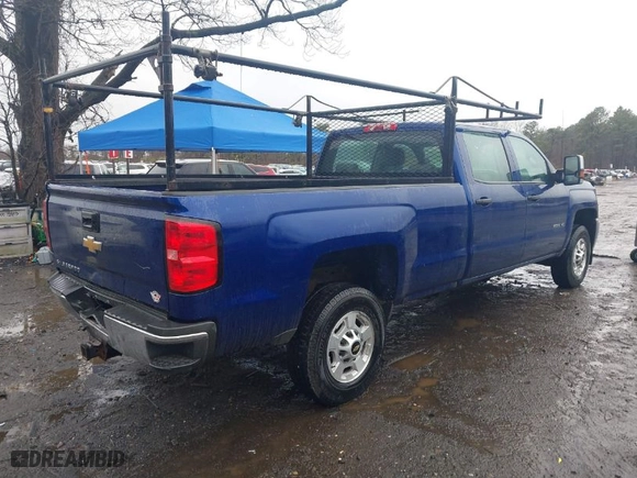 2015 Chevrolet Silverado 2500HD Work Truck with VIN 1GC1CUEG4FF120463, listed as a IAAI auction lot 41982942 with 110,604 mi miles. Bid and sale history available at carsss.com. Image 4.