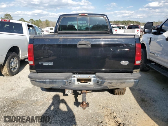 2000 Ford F-350 XL with VIN 1FTSW31FXYED30772, listed as a Copart auction lot 50606445 with 402,923 mi miles and Salvage title. Bid and sale history available at DreamBid. Image 6.