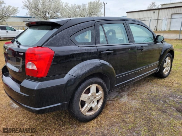 2007 Dodge Caliber SXT with VIN 1B3HB48B27D412371, listed as a IAAI auction lot 41800631 with 198,594 mi miles. Bid and sale history available at carsss.com. Image 4.